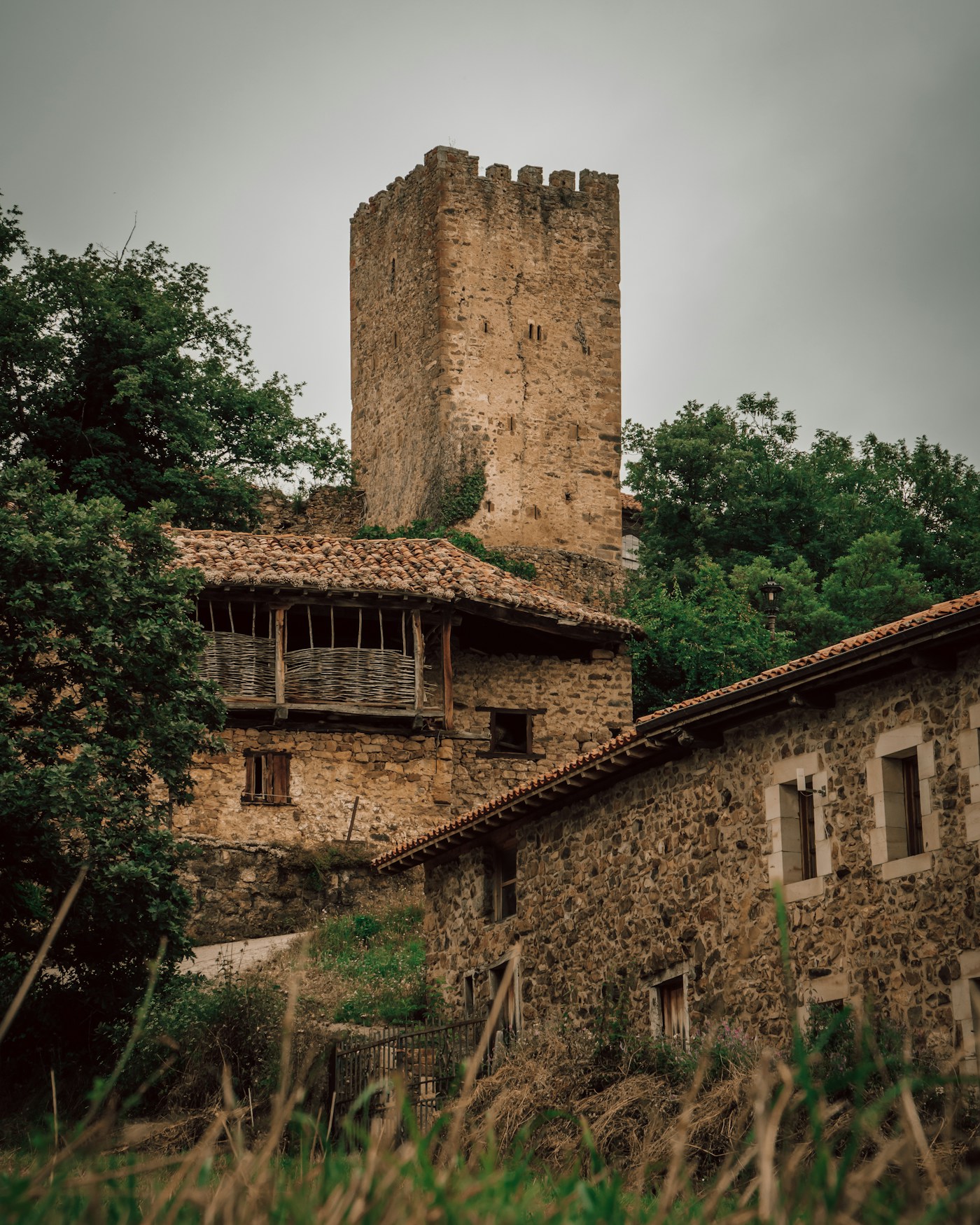 A stone building with a tower on top of it