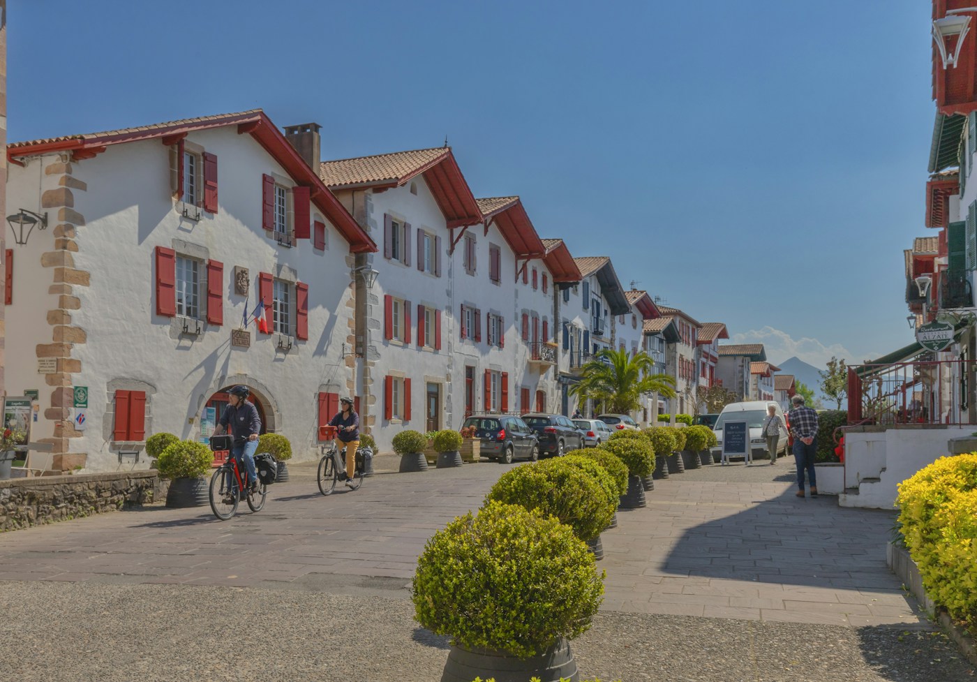 Colorful buildings line a quaint european street